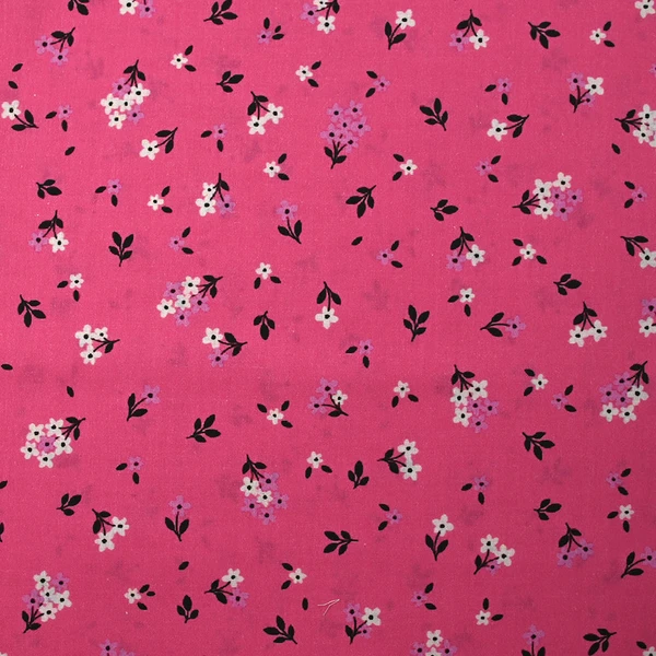 Popeline de coton imprimée fleurs printanières fond rose barbie