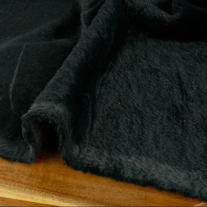 tissu fausse fourrure noir à paillettes – chaud et scintillant au mètre