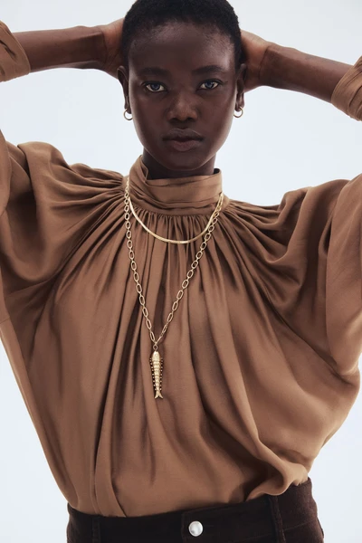 Blouse à effet drapé