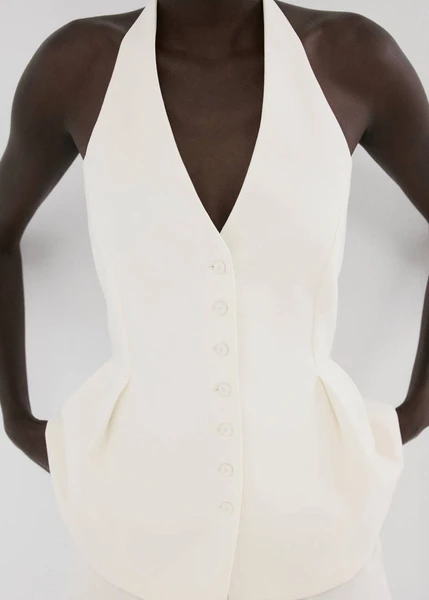 Top péplum col halter - Femme | MANGO France métropolitaine