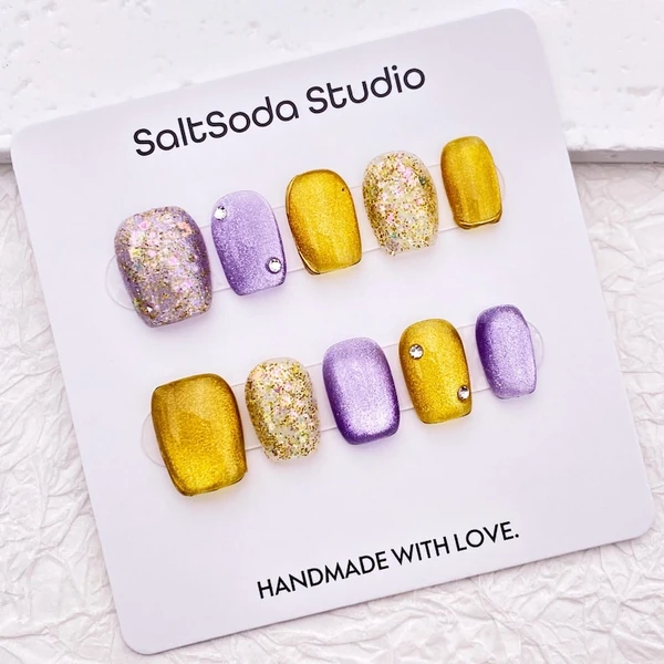 Ongles à presser oeil de chat scintillants : ongles carrés violets et jaunes