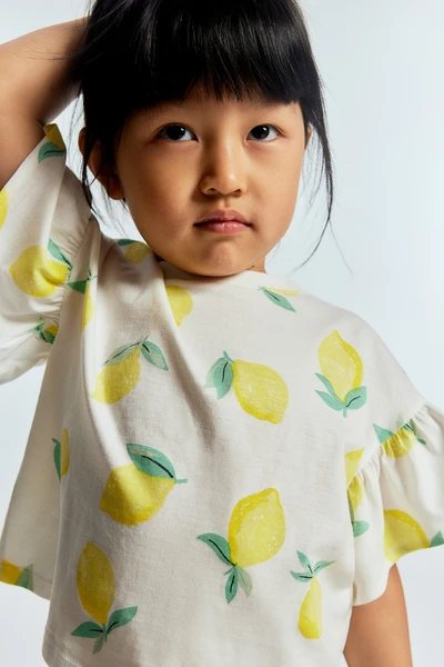 Flounce-sleeved jersey top
