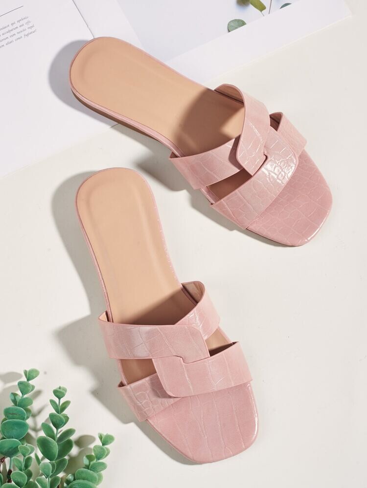Mules avec bandes croisées en relief de crocodile