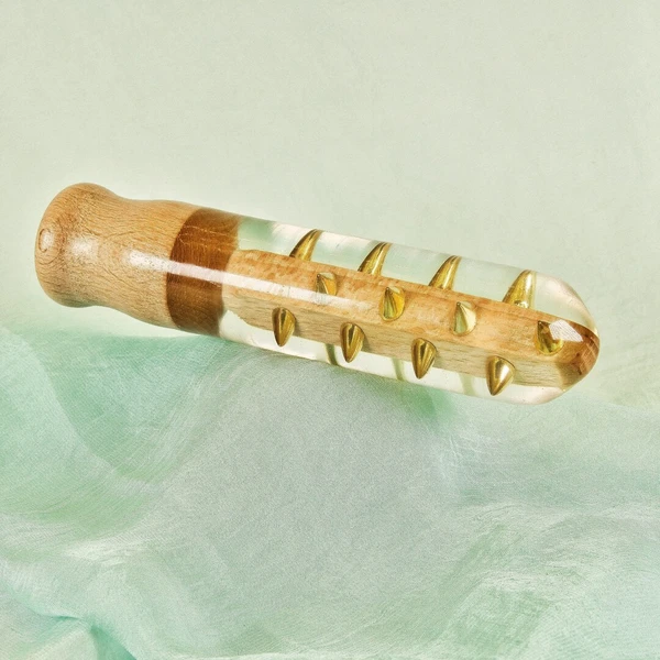 Gold wooden dildo with spikes