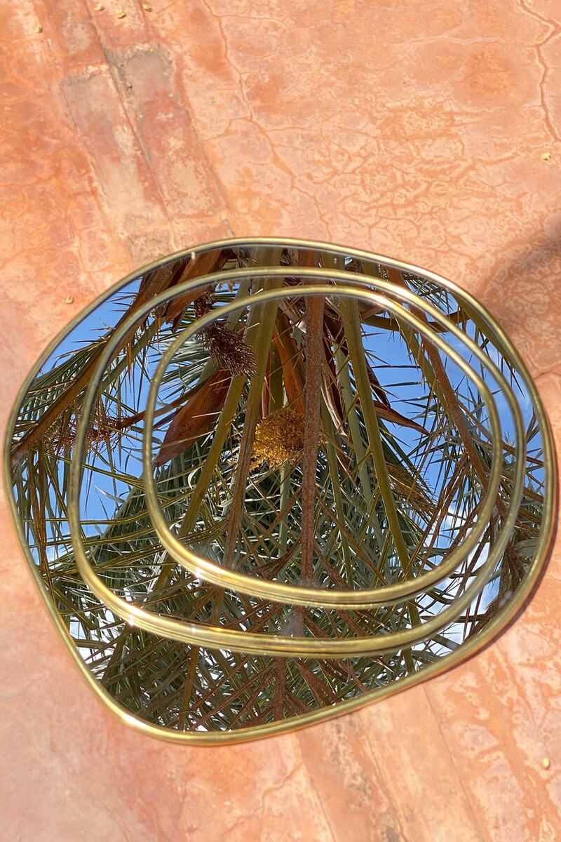 Miroir déformé décoratif en laitonS