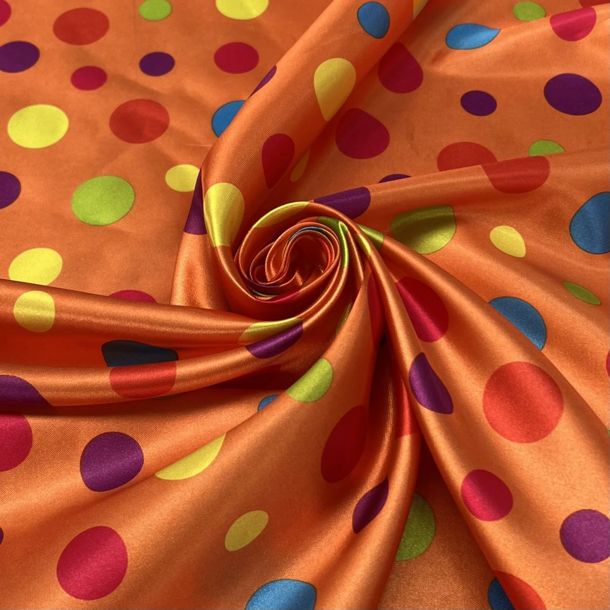 Tissu Satin Carnaval Orange Pois Multicolores au Mètre pour la confection de Déguisements