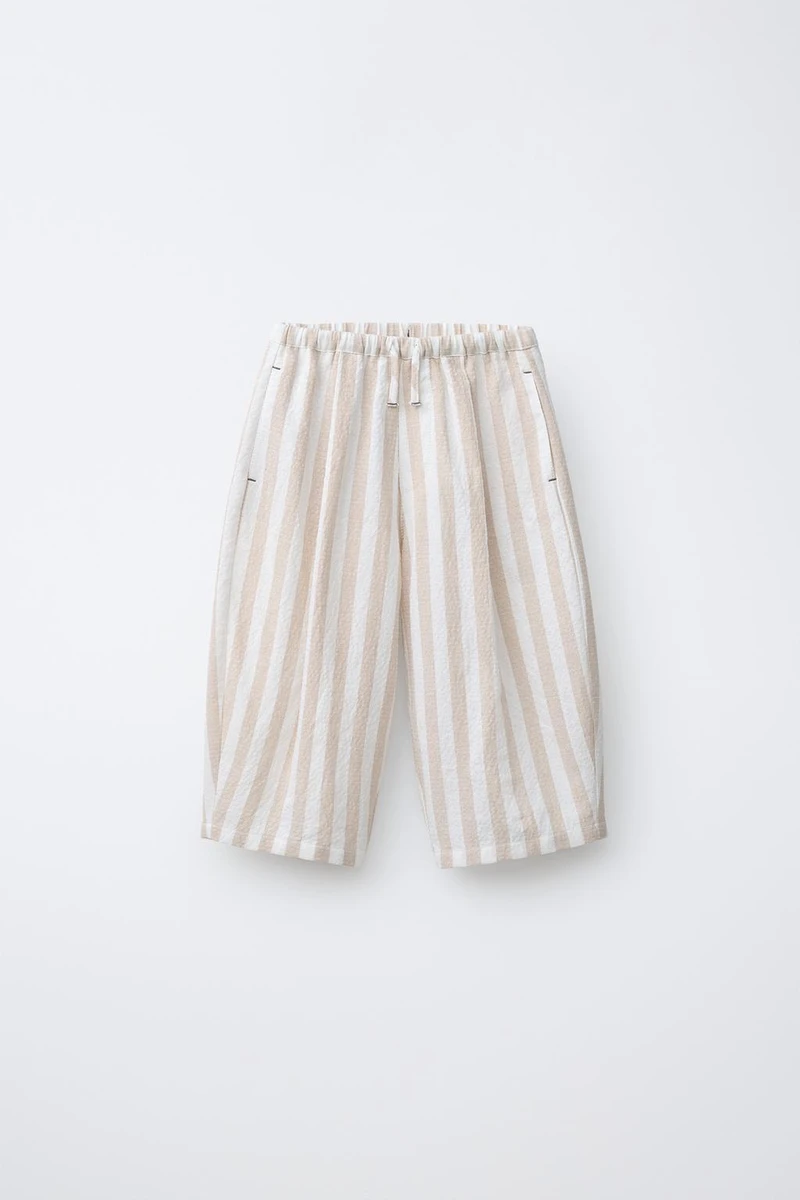 PANTALON BALLON À PLIS ET RAYURES